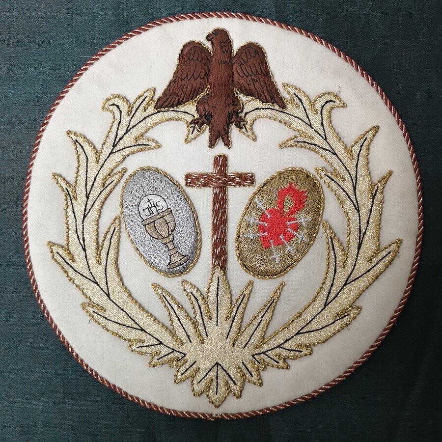 Escudo de la Hermandad del Cerro del Águila