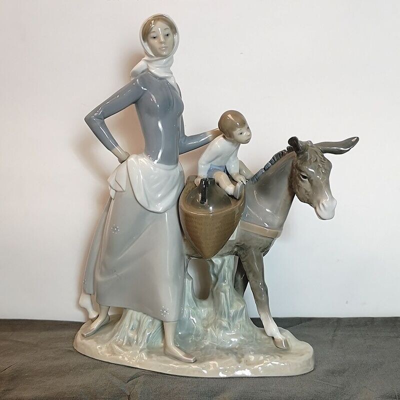Porcelana Lladró Mujer con Niño y Burro Porcelana Lladró Mujer con Niño y Burro