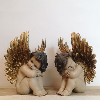 Pareja de Ángeles Sentados