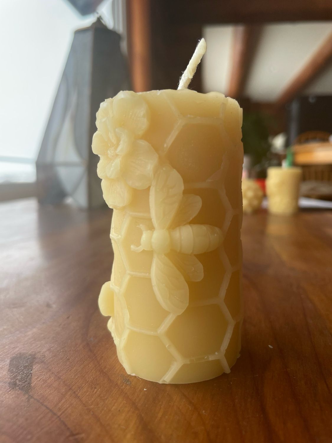 Candle: Pillar Med Hex Emboss With A bee 3.25&quot;h x 1.5&quot;Diam