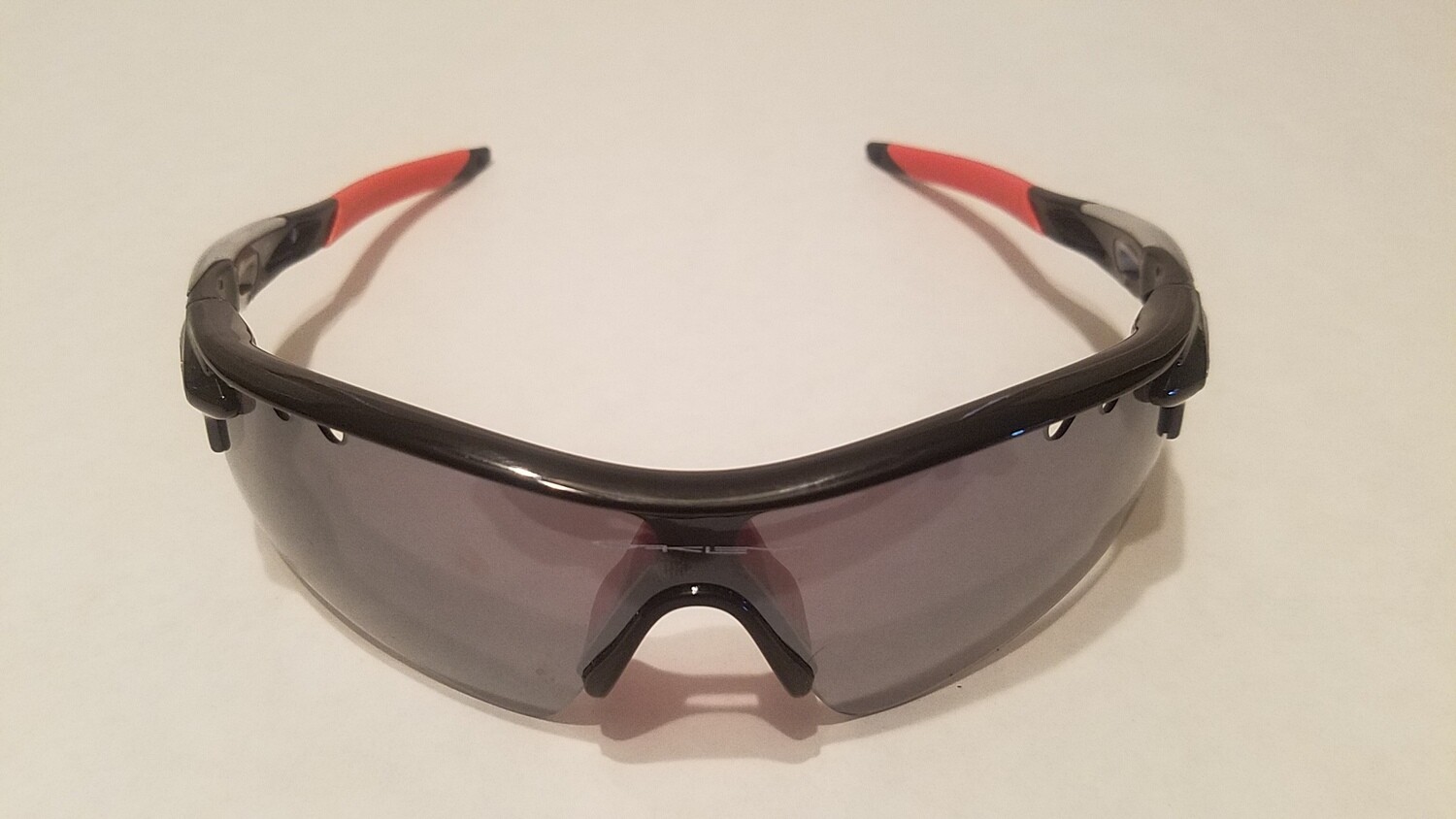 Sport Style Sunglasses :: Black Frames w/ Orange Nose and Earpiece