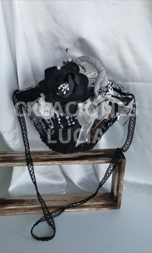 Bolso mas broche