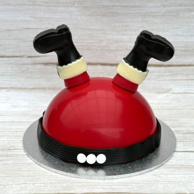 Santa Smash Cake in Sydney, red chocolate dome with chocolate legs and black belt