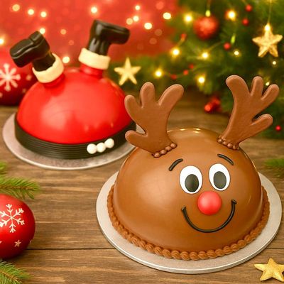 Christmas chocolate smash cakes with festive designs and treats - custom gifts for holiday celebrations.