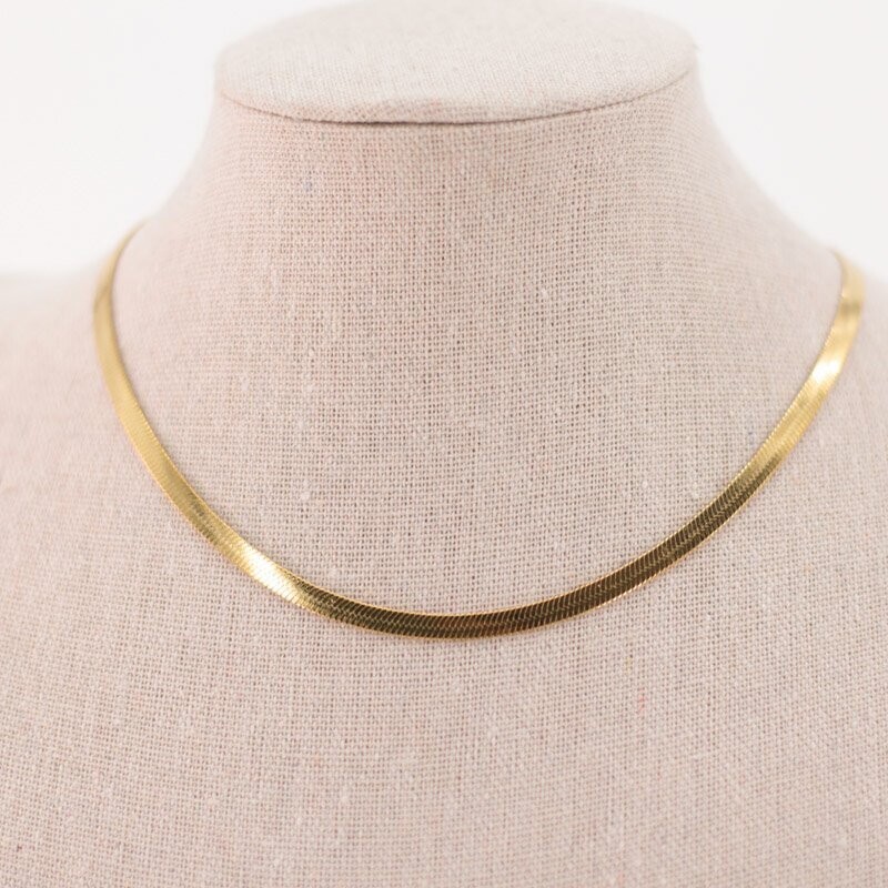 Collar acero dorado piel serpiente