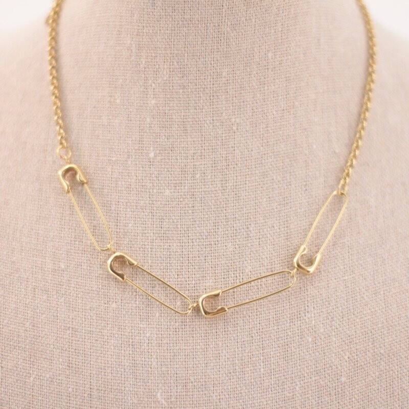 Collar acero dorado imperdibles