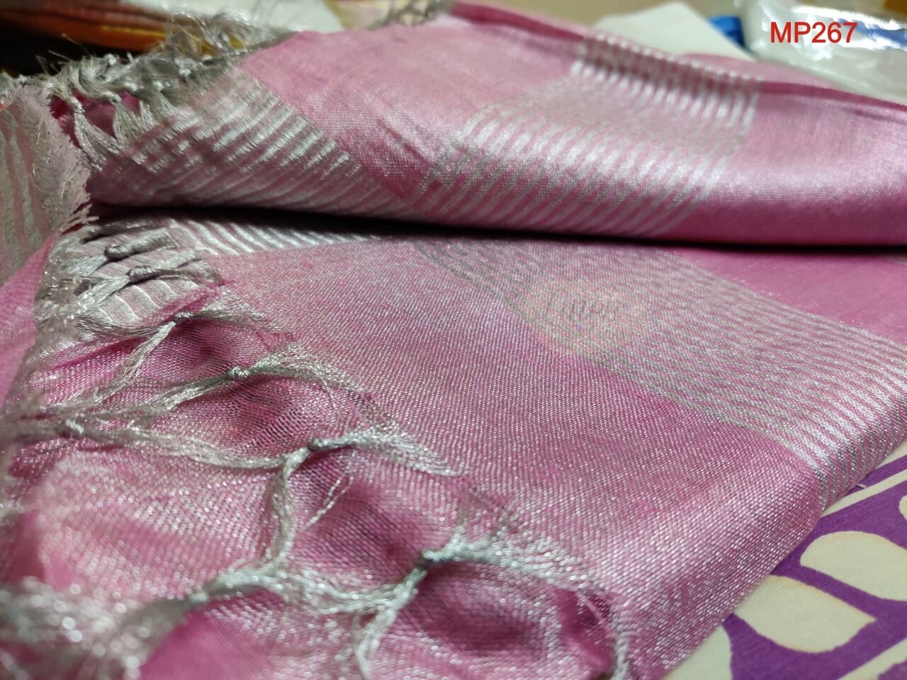 Pink shade tissue linen Saree