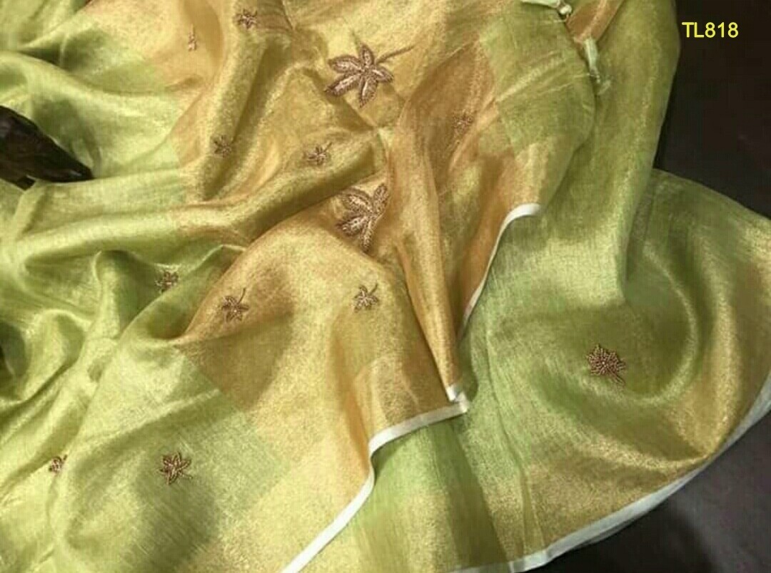 Green Golden shade tissue linen zari border saree with motifs work