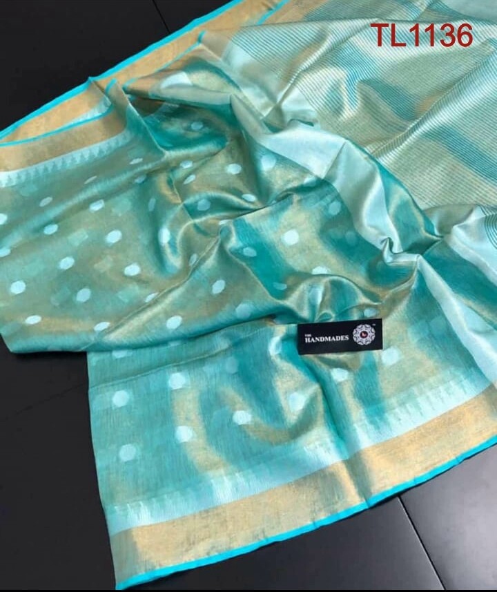 Green shade tissue linen temple border Saree with butta weaving