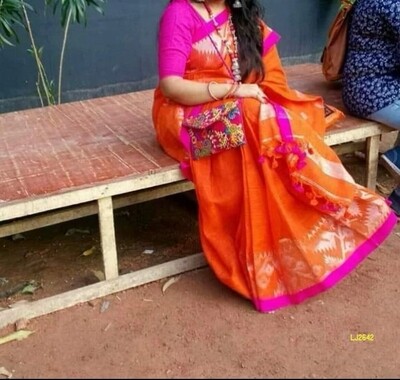 Orange shade handwoven Jamdani Linen Saree Orange shade handwoven Jamdani Linen Saree