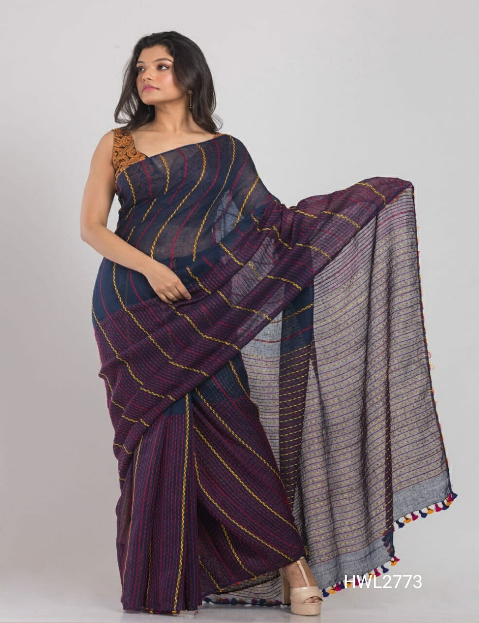 Threaded hand woven linen saree