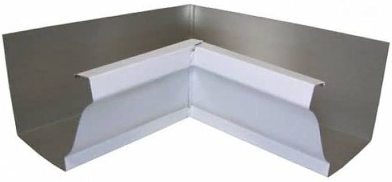 4 inch white inside corner fitting for gutter systems.