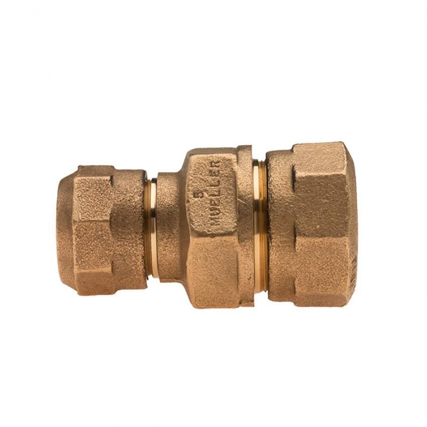 3/4 inch Mueller brass compression coupling for joining copper tubing without solder.