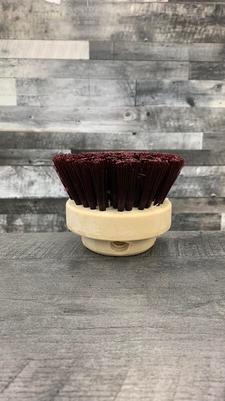 Coarse round scrub brush for cleaning decks, floors, and outdoor surfaces.