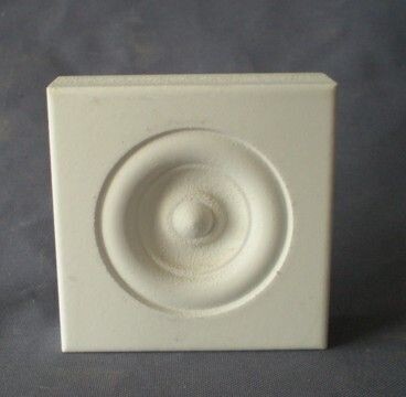 2.5 inch MDF rosette in a contemporary style for door and window trim corners.