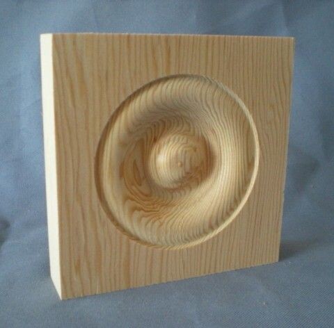 3.5 Inch fir rosette in button style for door and window trim corners.