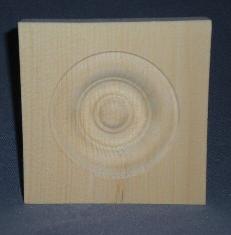 3.5 Inch pine rosette in button style for door and window trim corners.