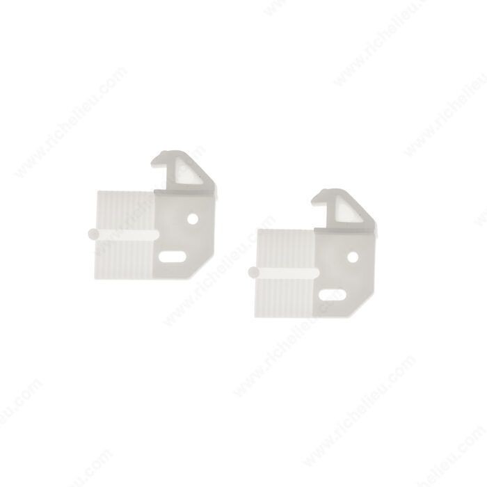 White plastic drawer glides for smooth cabinet drawer movement.