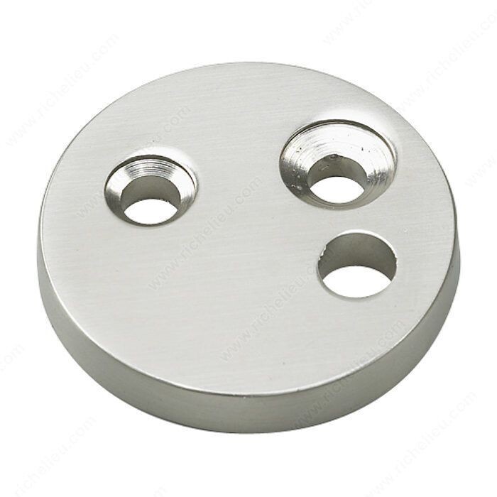 Brushed nickel door stop riser, adds 1/4 inch of height for door hardware.