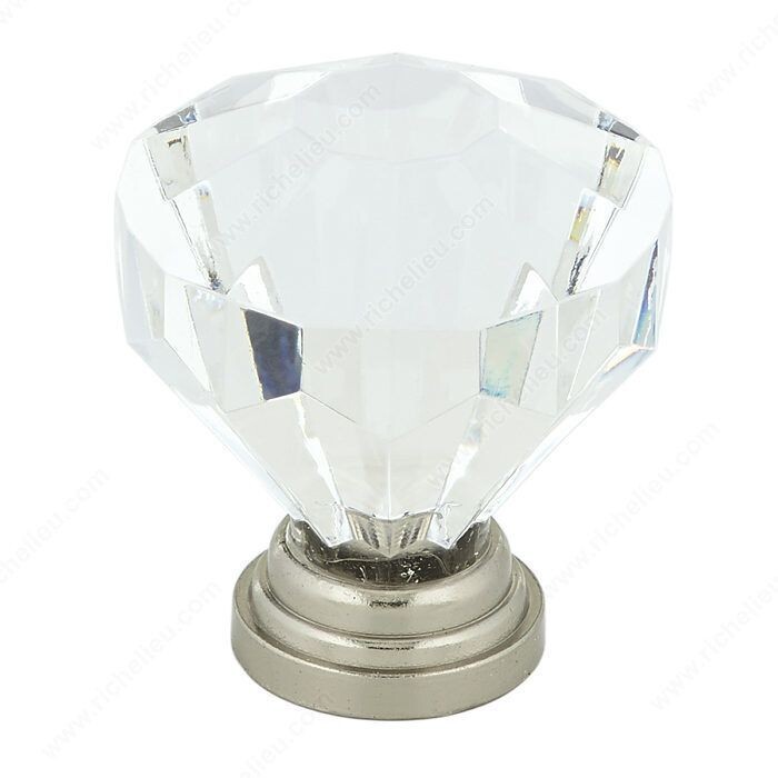 Acrylic and metal cabinet knob for cabinets and drawers.