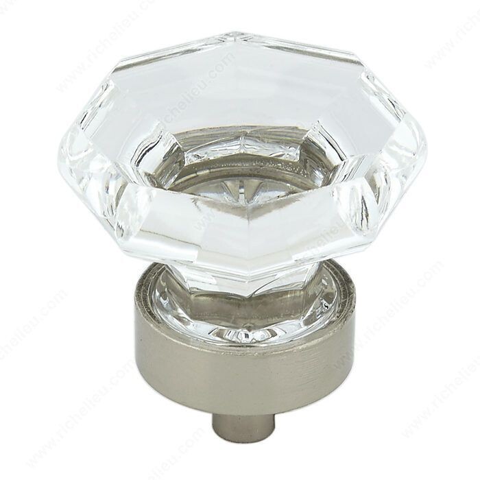 Metal and acrylic cabinet knob with an eclectic design.