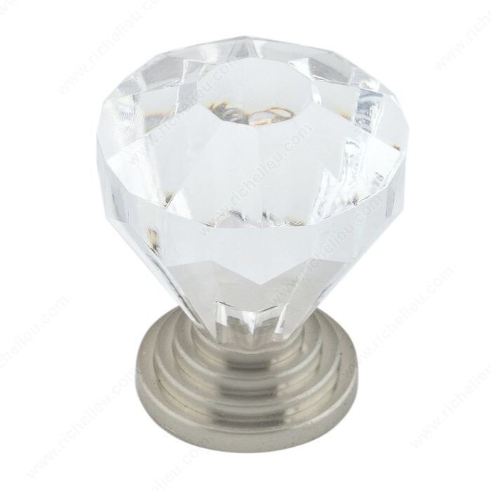 Acrylic and metal cabinet knob for kitchen or bathroom cabinets.