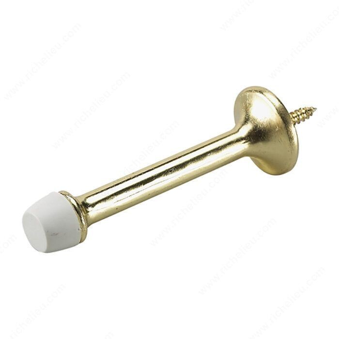3 3 inch rigid brass door stop for mounting behind a door.