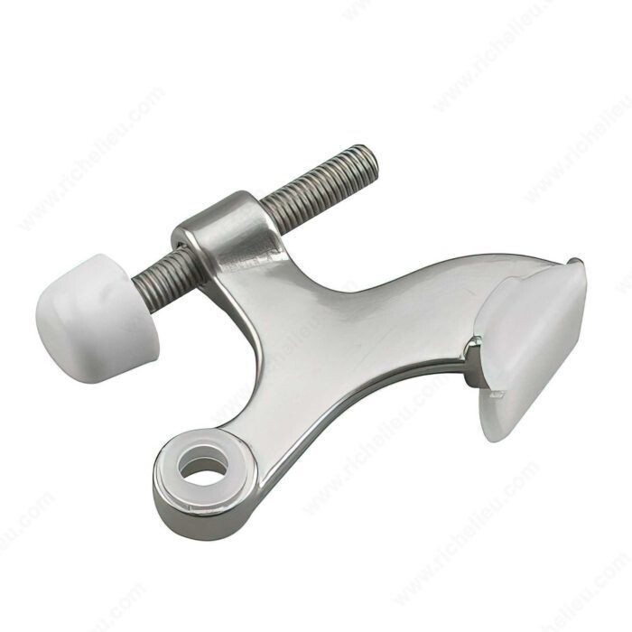 Hinge pin door stop in brushed nickel for protecting walls and trim.