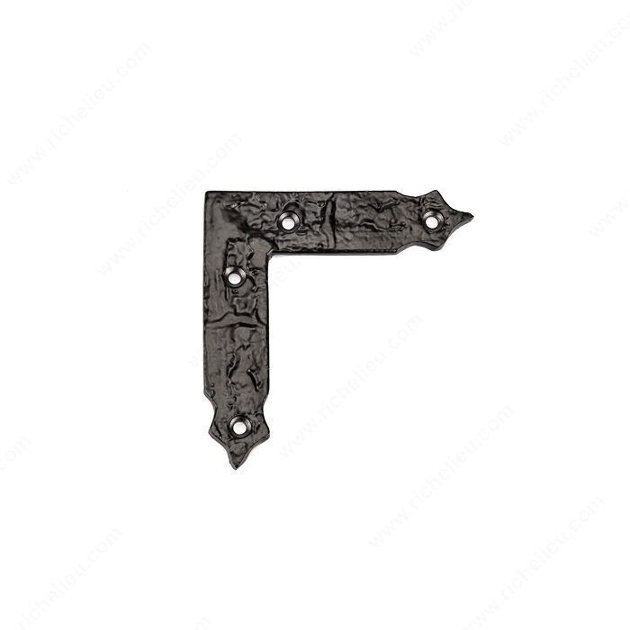 Decorative corner bracket for finishing barn door corners.