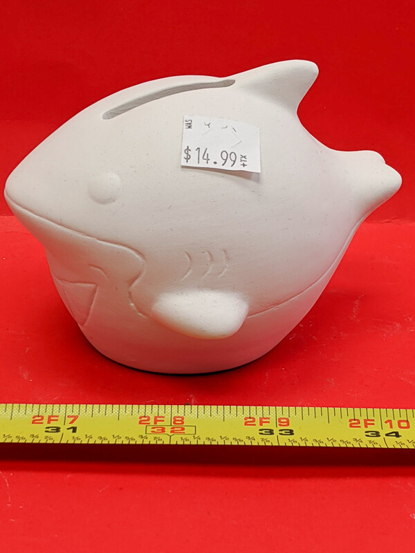 Little Shark figurine to paint. Paint your own DIY plaster figurine Art Craft activity. With Paint and brushes.