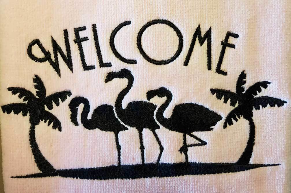 Black Flamingo With Welcome On Pink Towel Black Flamingo With Welcome On Pink Towel