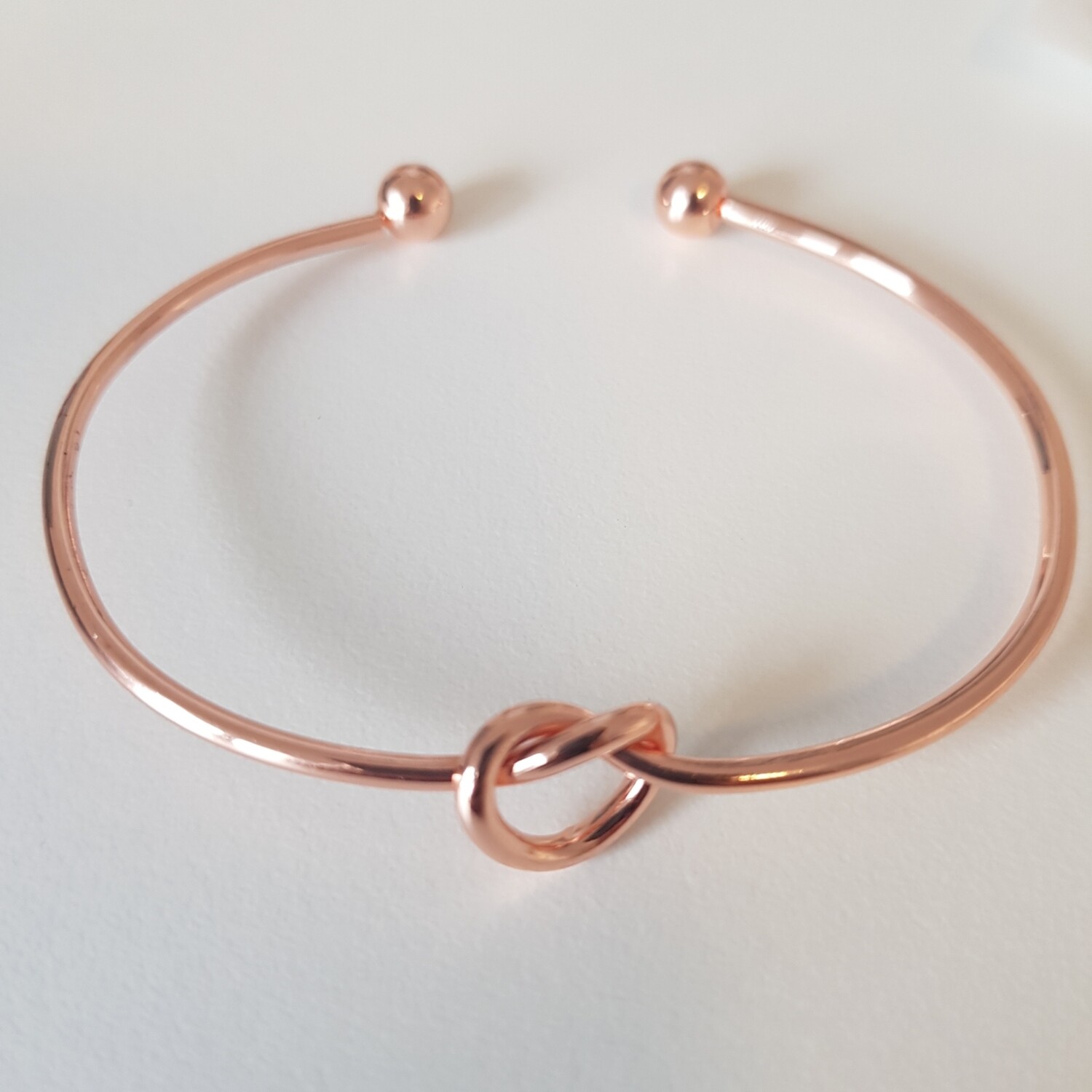 Knotted armband rosé goud