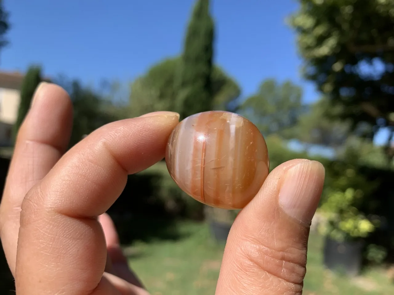 Pierre roulée Cornaline rubanée AA naturelle — Brésil