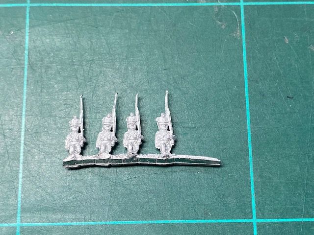 AD SNX 02C Musketeer, shako, marching