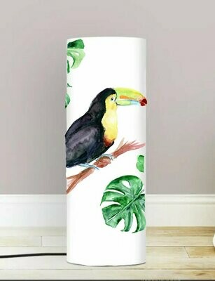 Tropical tucan lamp with green leaves