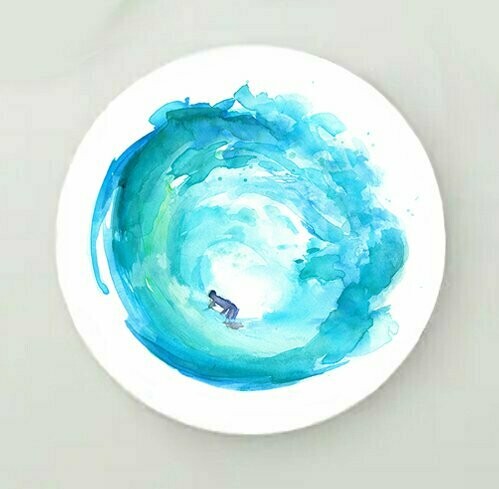 Teal wave and surfer on circular foamboard