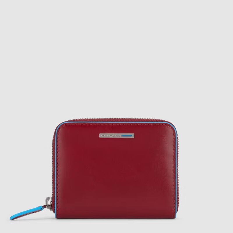 Piquadro.
Portafoglio a soffietto con zip.
Colore: Rosso