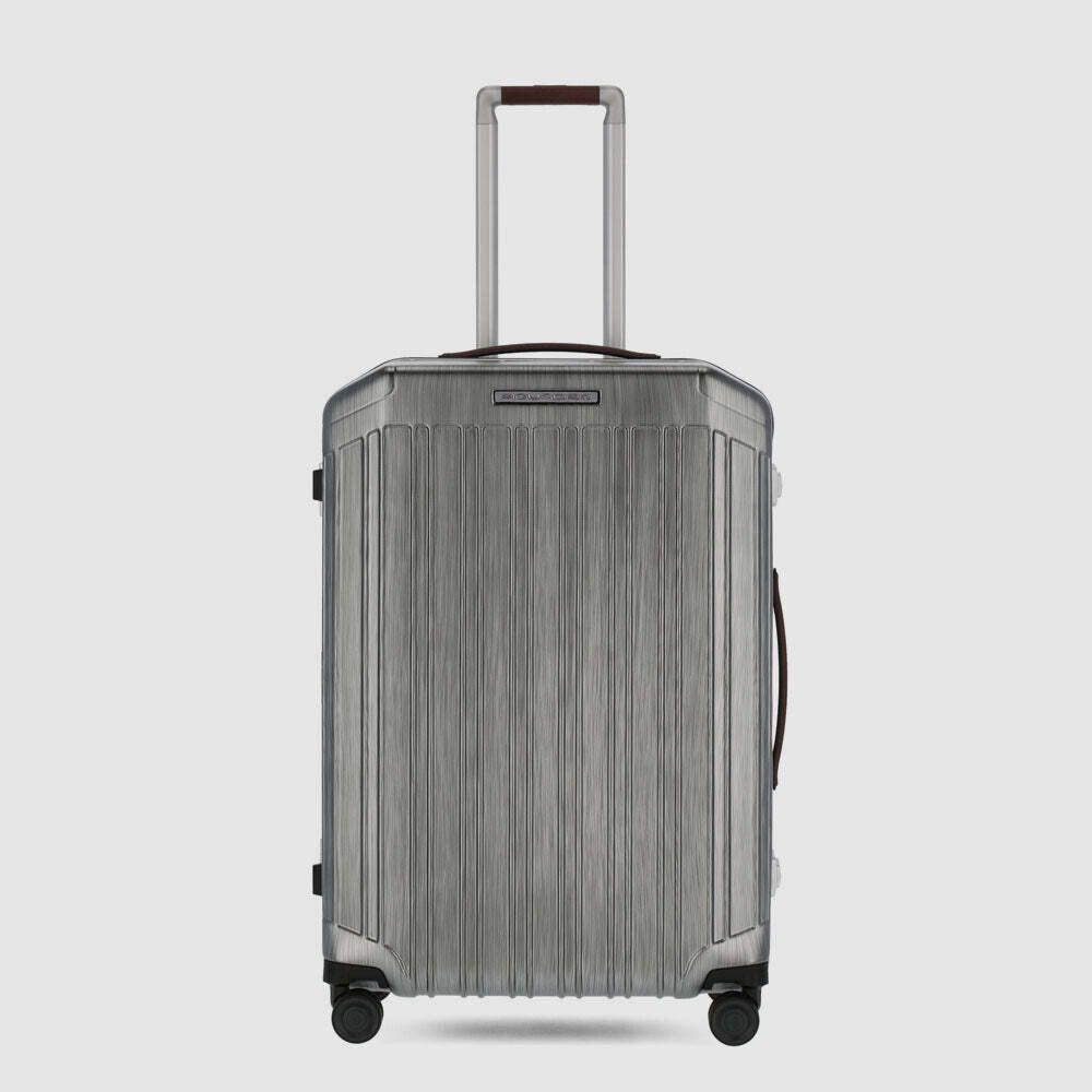 Piquadro.
Trolley medio rigido a quattro ruote.
Colore: Nero-Cuoio.