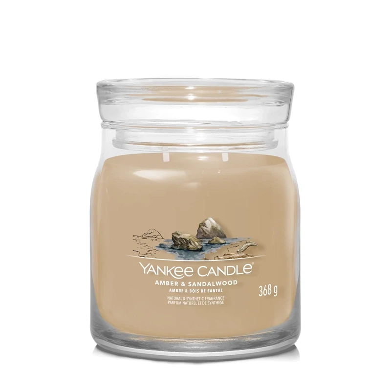 Yankee Candle.
Amber &amp; Sandalwood.
Giara media.