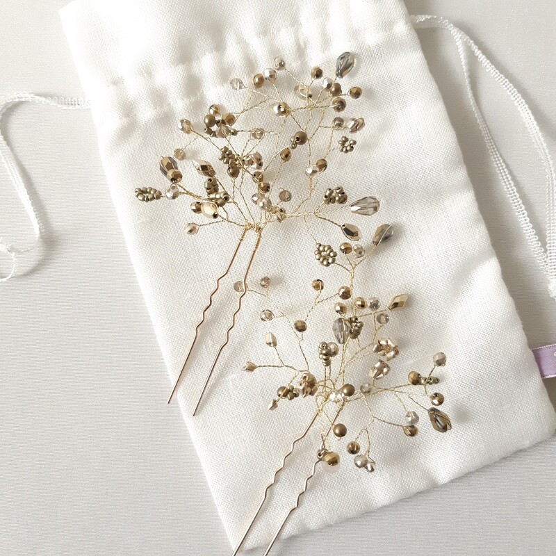 Haarpins - set van 2 pins met brons kleurige parels