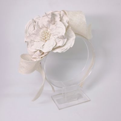 Diadeem met grote krul en bloem