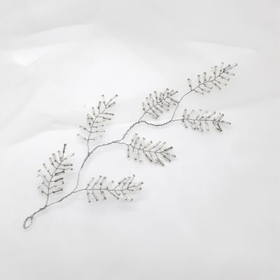 Haarjuweel - veer in zilverdraad en staafjes