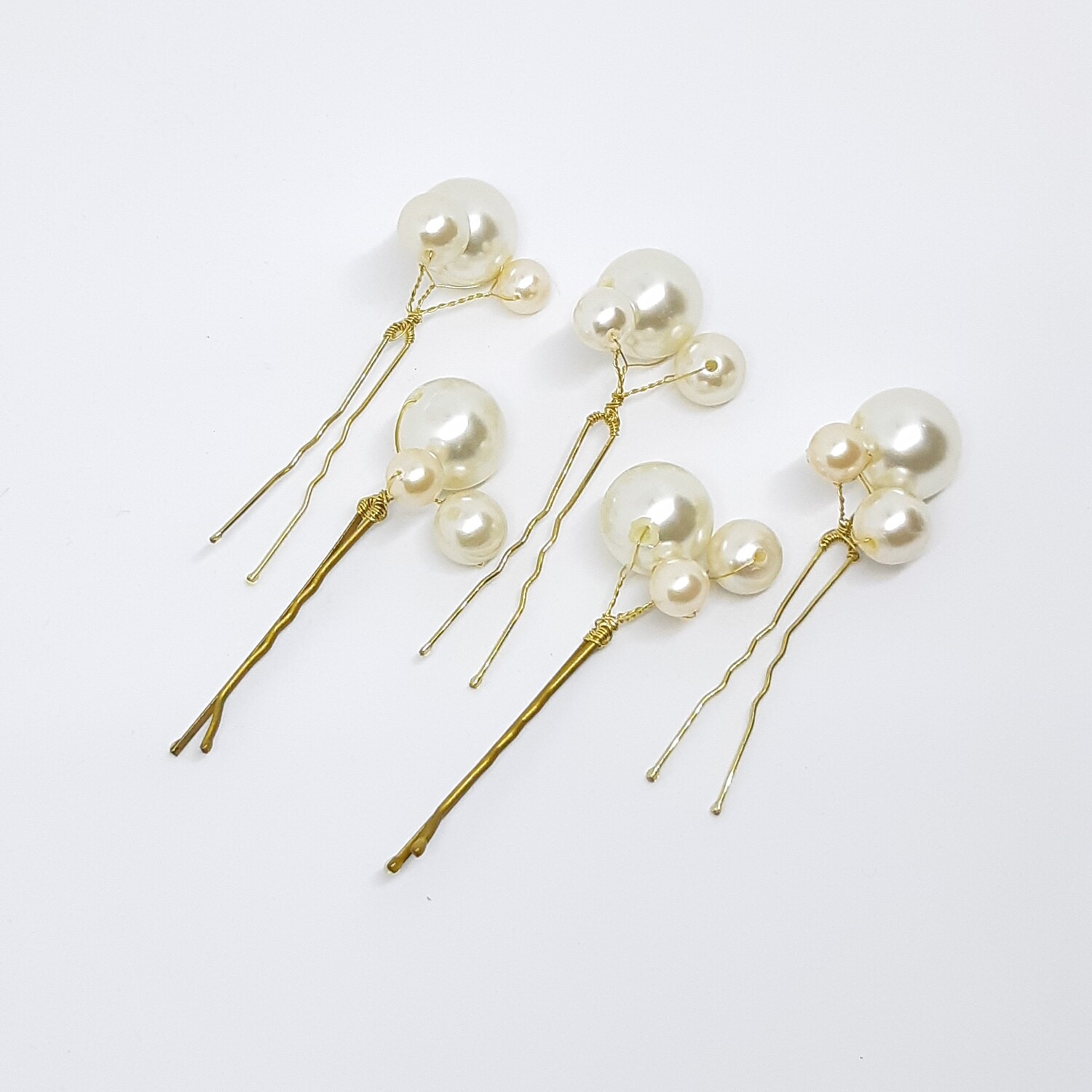 Haarpins en Bobbypins  set van 5 pins met 3 parelmoer parels per pin