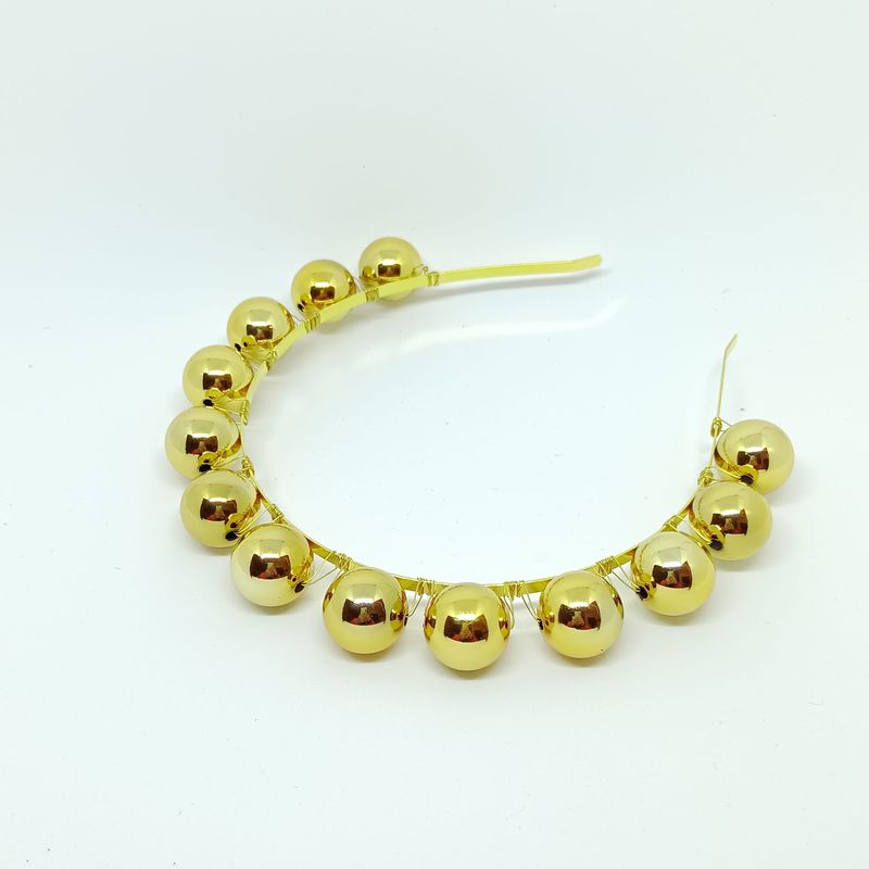 Diadeem met grote goudkleurige parels