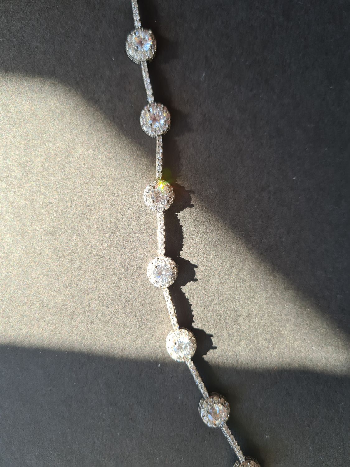 Stunning Halo design silver tennis bracelet
