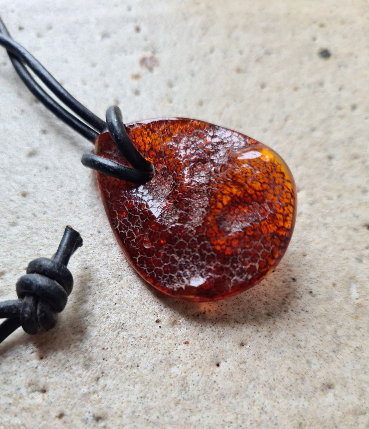 Organic shaped Amber on leather cord