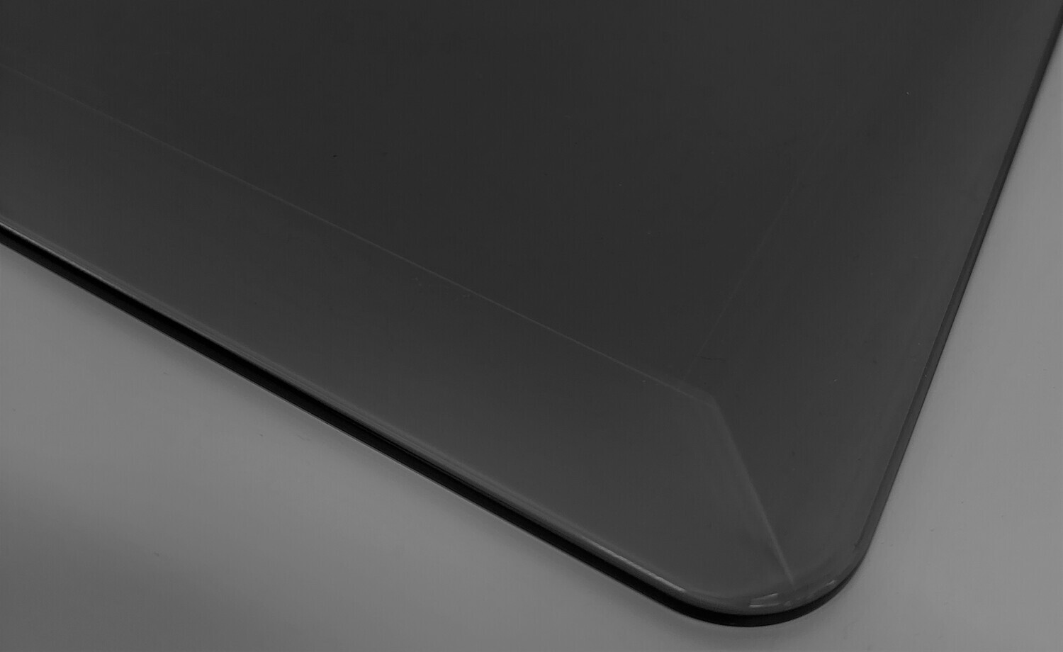 Takaneduslasi harmaa 600x400