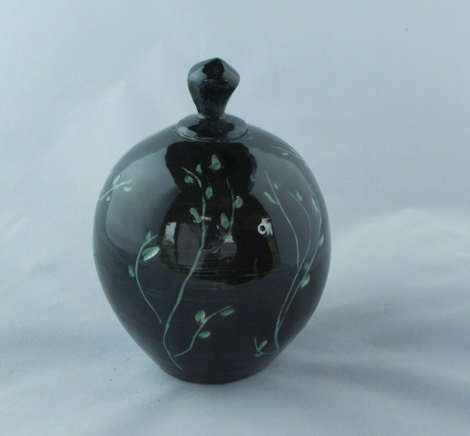 Black lidded pot