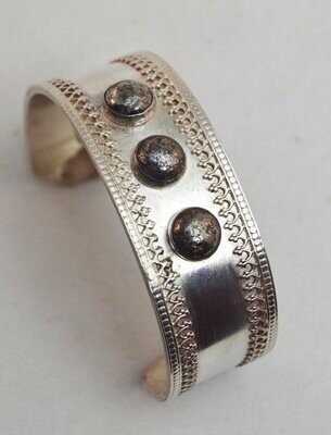 Sterling Bracelet with filigree and 3 7mm Pyrite stones.