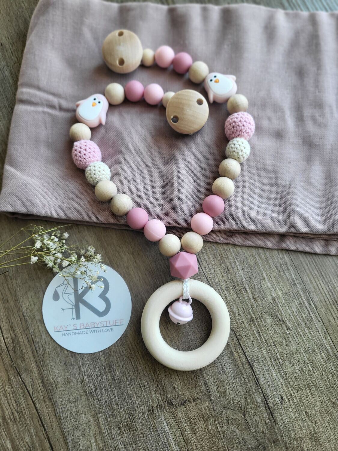 Kinderwagenkette Pinguin rosa